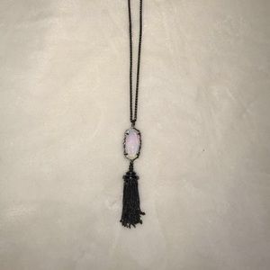 Rayne Kendra Scott necklace w an iridescent stone.